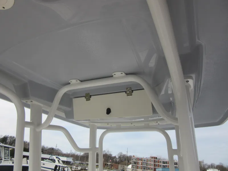 Slide: The Image of 2024 Robalo 226 Cayman T-top with storage compartment. - 11