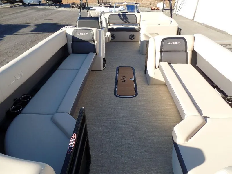 Slide: The Image of 2024 Harris Cruiser 250 pontoon boat interior with spacious seating and modern design. - 14