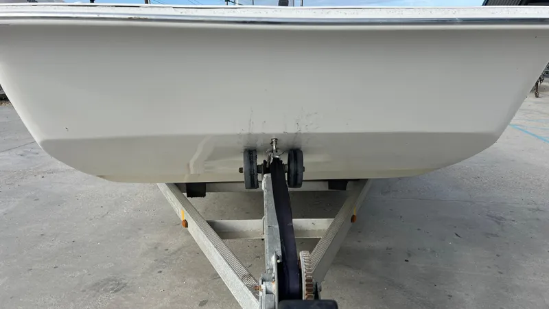 Slide: The Image of 2013 Carolina Skiff 198DLX boat on trailer, rear view. - 4