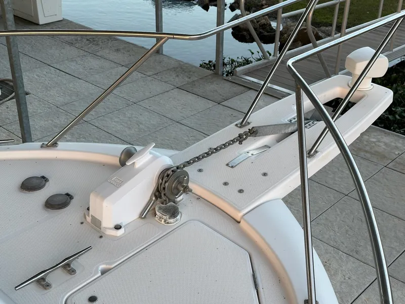 Slide: The Image of Bow of 1997 Bayliner 3988 Motoryacht with anchor chain and railing. - 6