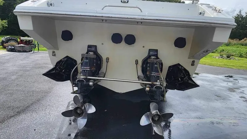 Slide: The Image of 1996 Formula 382 SR1 boat rear view with dual propellers. - 19