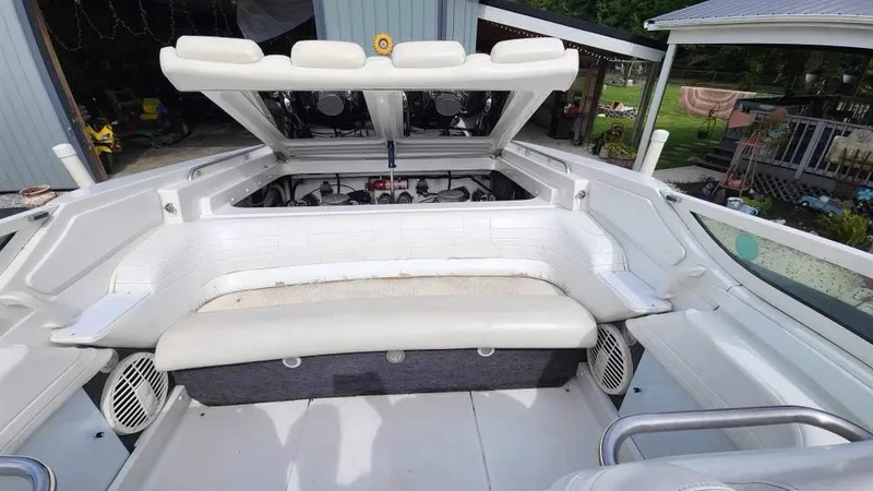 Slide: The Image of 1996 Formula 382 SR1 boat interior with open engine compartment. - 6