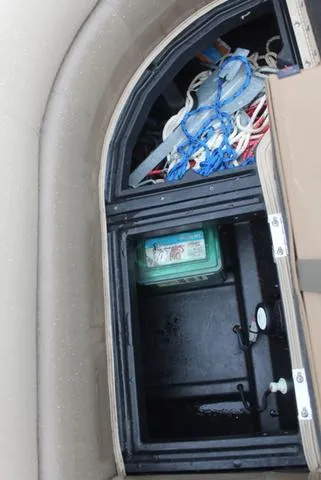Slide: The Image of Storage compartment of 2022 Veranda VF25F2 boat with ropes and equipment. - 13