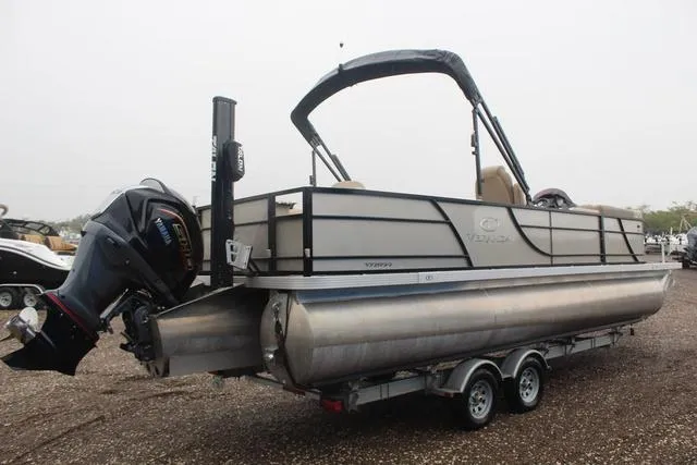 Slide: The Image of 2022 Veranda VF25F2 pontoon boat on trailer, featuring outboard motor. - 4