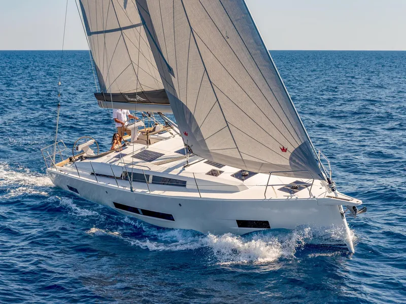 Slide: The Image of 2024 Hanse 410 sailing yacht cruising on open sea. - 1
