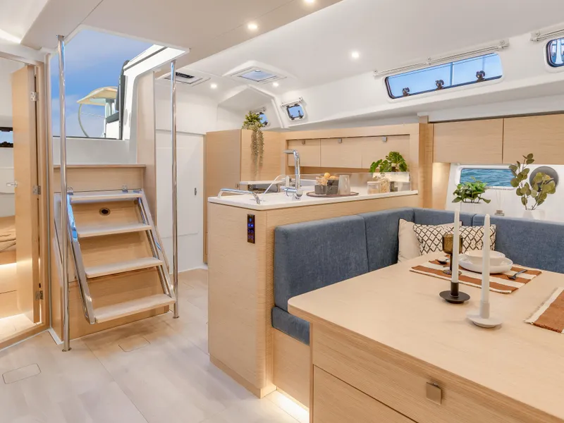 Slide: The Image of Modern interior of 2024 Hanse 410 yacht with dining area and kitchen. - 18