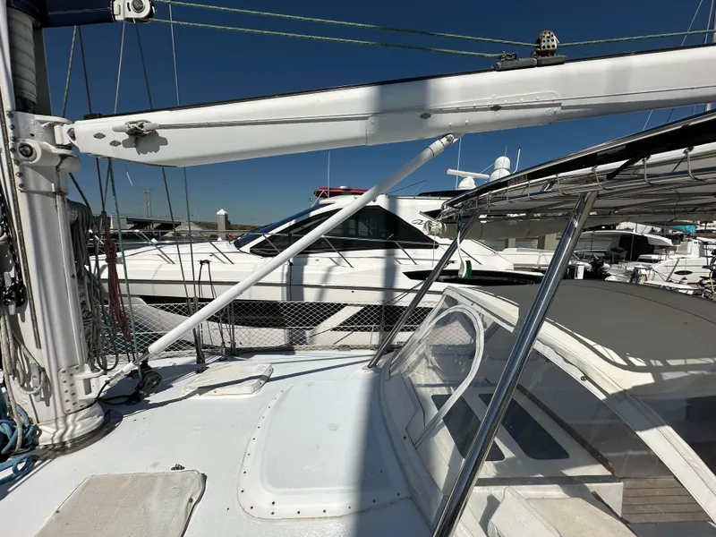 Slide: The Image of 1989 Concordia 52 sailboat docked at marina with other boats. - 35