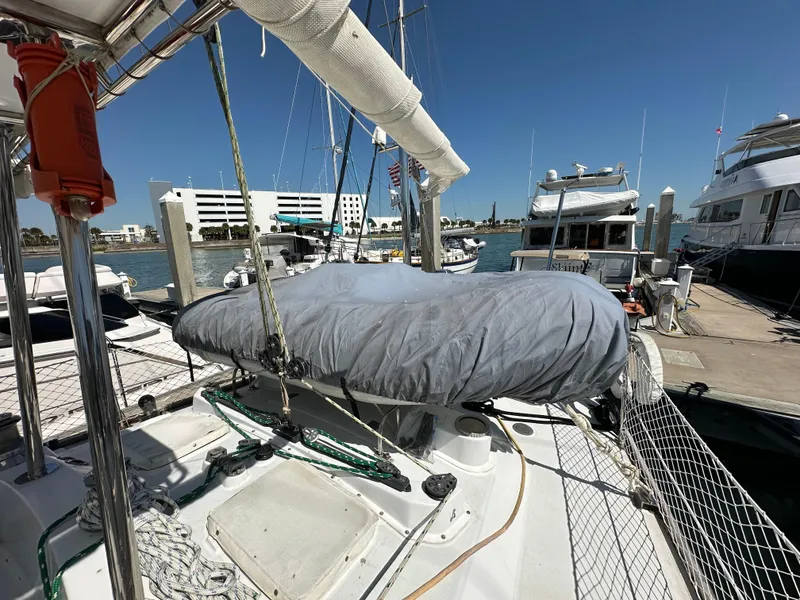 Slide: The Image of Concordia 52 sailboat docked at marina, covered mainsail, 1989 model. - 38