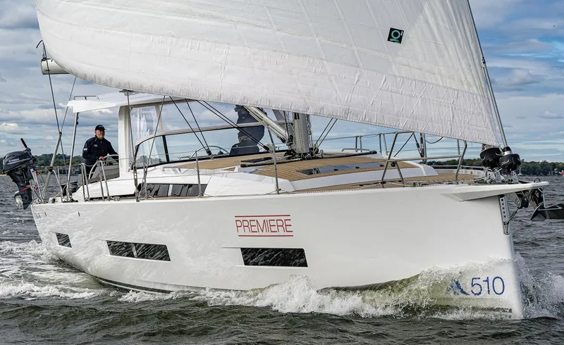 The Image of 2024 Hanse 510 sailboat on clear blue water. - 0