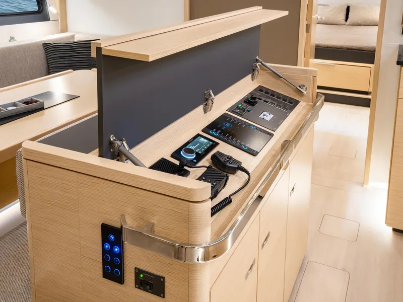 Slide: The Image of Modern kitchen interior of 2024 Hanse 510 yacht with sleek wooden cabinetry. - 10