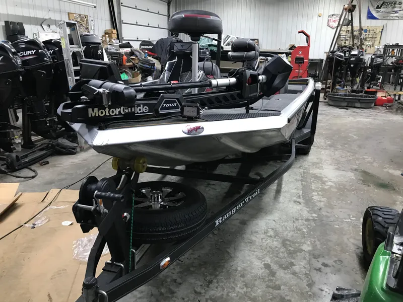 Slide: The Image of 2018 Ranger RT178 boat in a garage, equipped with MotorGuide trolling motor. - 14