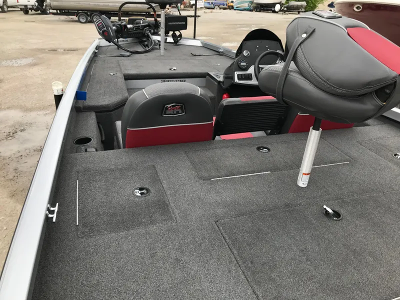 Slide: The Image of 2018 Ranger RT178 fishing boat interior with seating and control panel. - 40