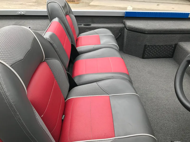 Slide: The Image of 2018 Ranger RT178 boat interior with red and gray seating. - 43