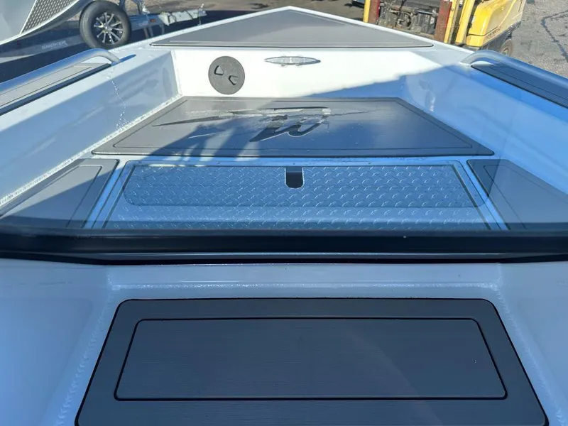 Slide: The Image of 2024 Weldcraft 200 Revolution boat deck with storage compartments. - 8