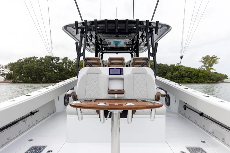 Slide: The Image of 2024 Freeman 42 LR boat interior with seating and table. - 17