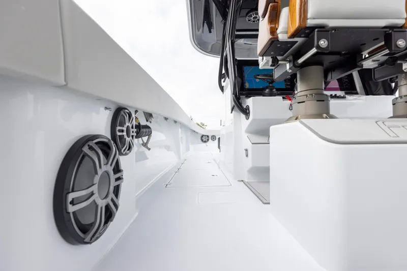 Slide: The Image of 2024 Freeman 42 LR boat interior with speakers and seating. - 28