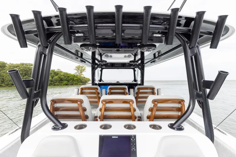 Slide: The Image of 2024 Freeman 42 LR boat interior with seating and rod holders. - 33