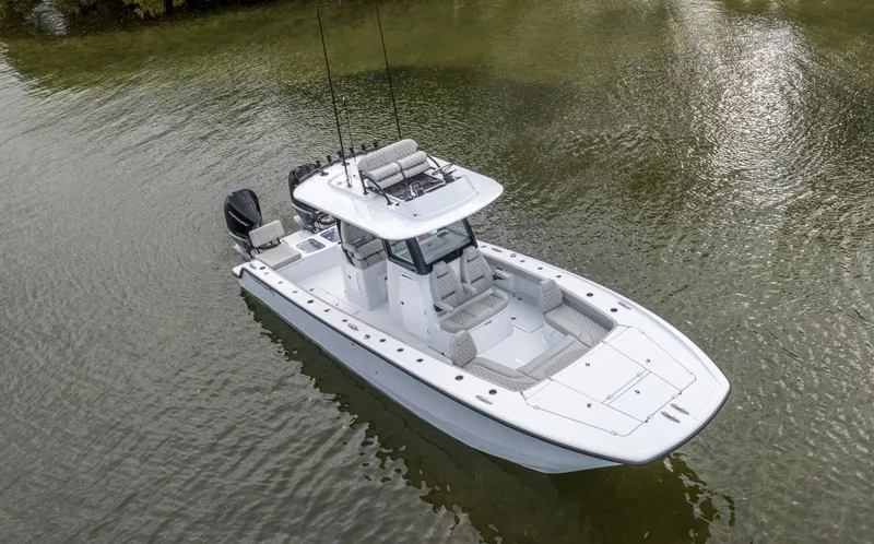 Slide: The Image of 2024 Freeman 28 boat on calm water. - 10