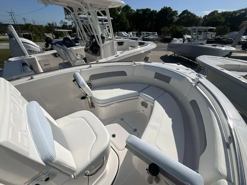 Slide: The Image of 2024 Robalo 222 Explore boat with spacious seating and modern design. - 15