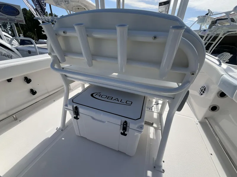 Slide: The Image of 2024 Robalo 222 Explore boat interior with storage and seating. - 8