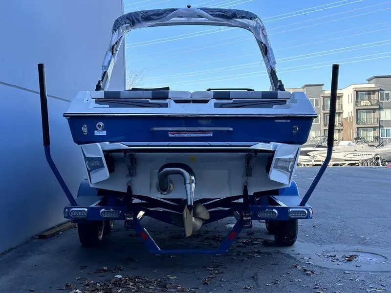 Slide: The Image of 2024 Malibu 21 LX-R boat on trailer, rear view. - 3