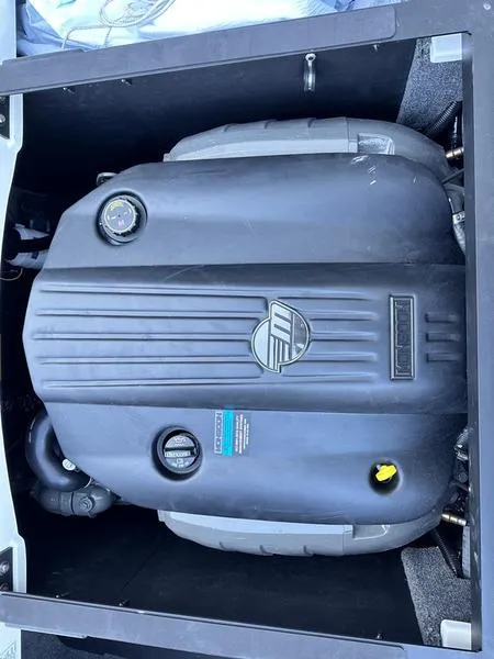 Slide: The Image of 2024 Malibu 21 LX-R boat engine compartment. - 7