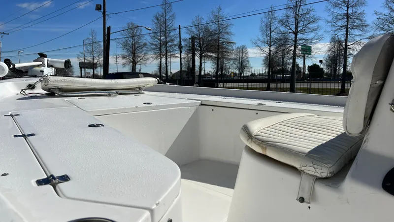 Slide: The Image of 2005 Sea Pro SV2100 CC boat interior with seating and storage compartments. - 10