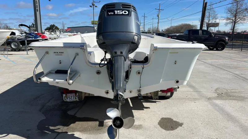 Slide: The Image of 2005 Sea Pro SV2100 CC boat with V6 150 outboard motor, rear view. - 16