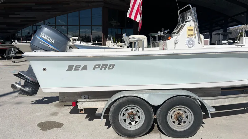 Slide: The Image of 2005 Sea Pro SV2100 CC boat on a trailer with a Yamaha outboard motor. - 3