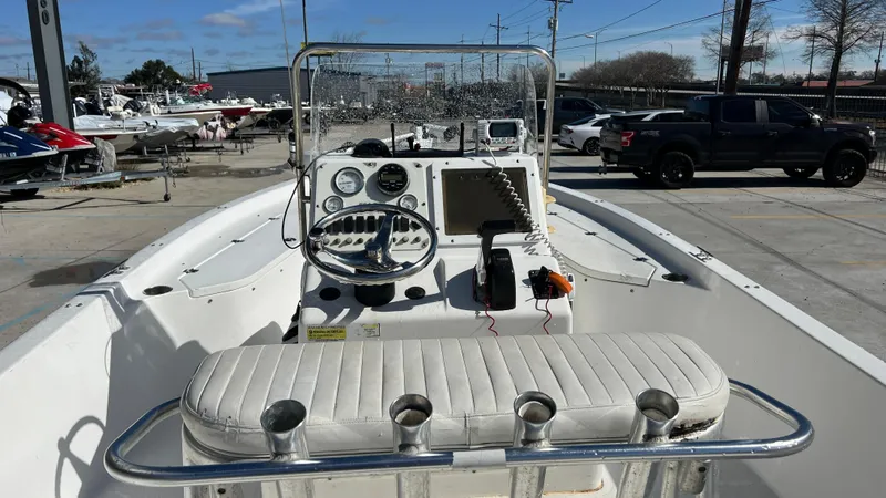 Slide: The Image of 2005 Sea Pro SV2100 CC center console boat with steering wheel and navigation equipment. - 8