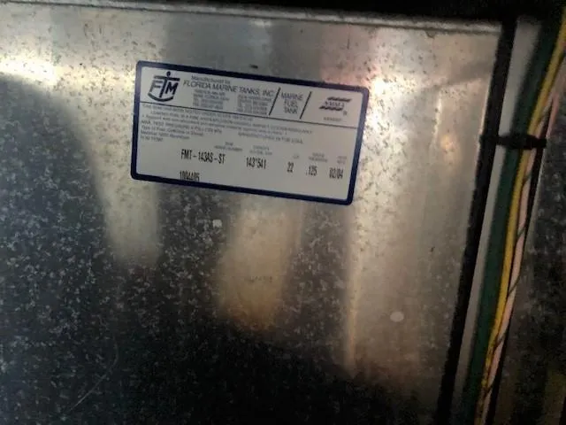 Slide: The Image of Label on a 2004 Silverton 34C boat component with wiring visible. - 4