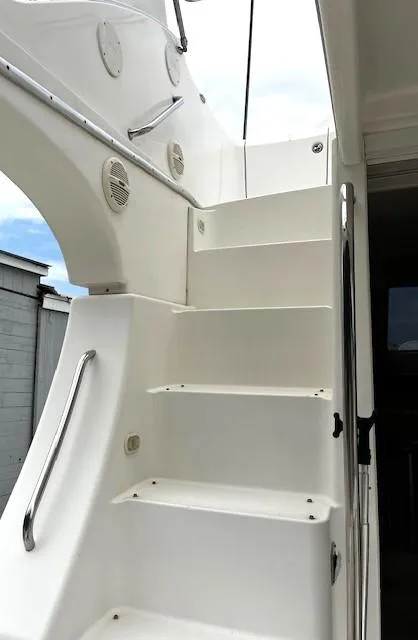 Slide: The Image of Staircase on a 2004 Silverton 34C yacht, leading to the upper deck. - 47