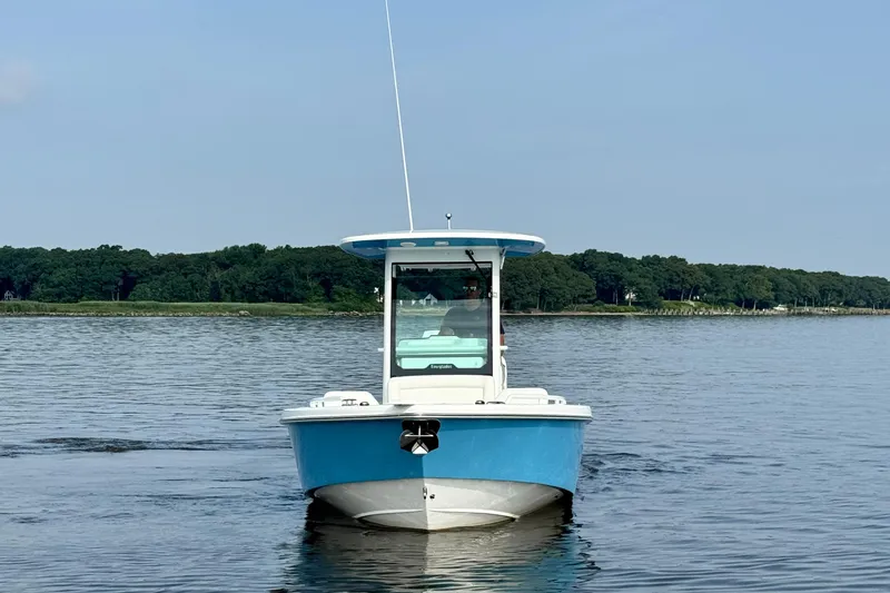 Slide: The Image of 2024 Everglades 253 Center Console boat on calm water. - 10
