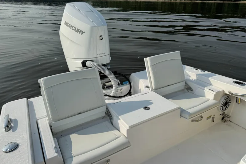 Slide: The Image of 2024 Everglades 253 Center Console boat with Mercury outboard engine. - 12