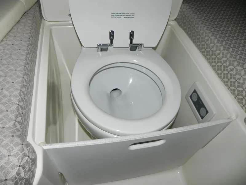 Slide: The Image of 2015 Chris-Craft 28 Heritage Corsair boat toilet, compact and functional marine bathroom feature. - 26