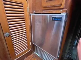 Slide: The Image of Stainless steel refrigerator in 1984 Tayana 55 yacht galley. - 29
