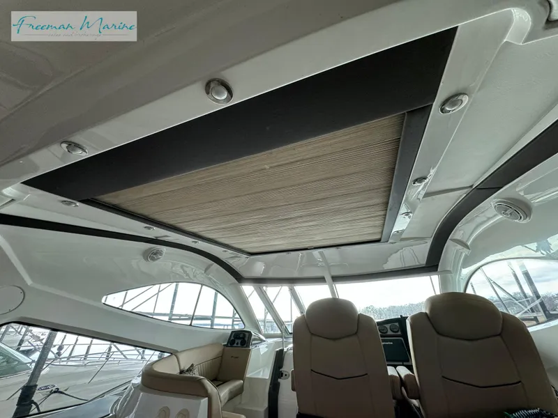 Slide: The Image of Interior of 2014 Cruisers Yachts 540 Sports Coupe with panoramic sunroof. - 47