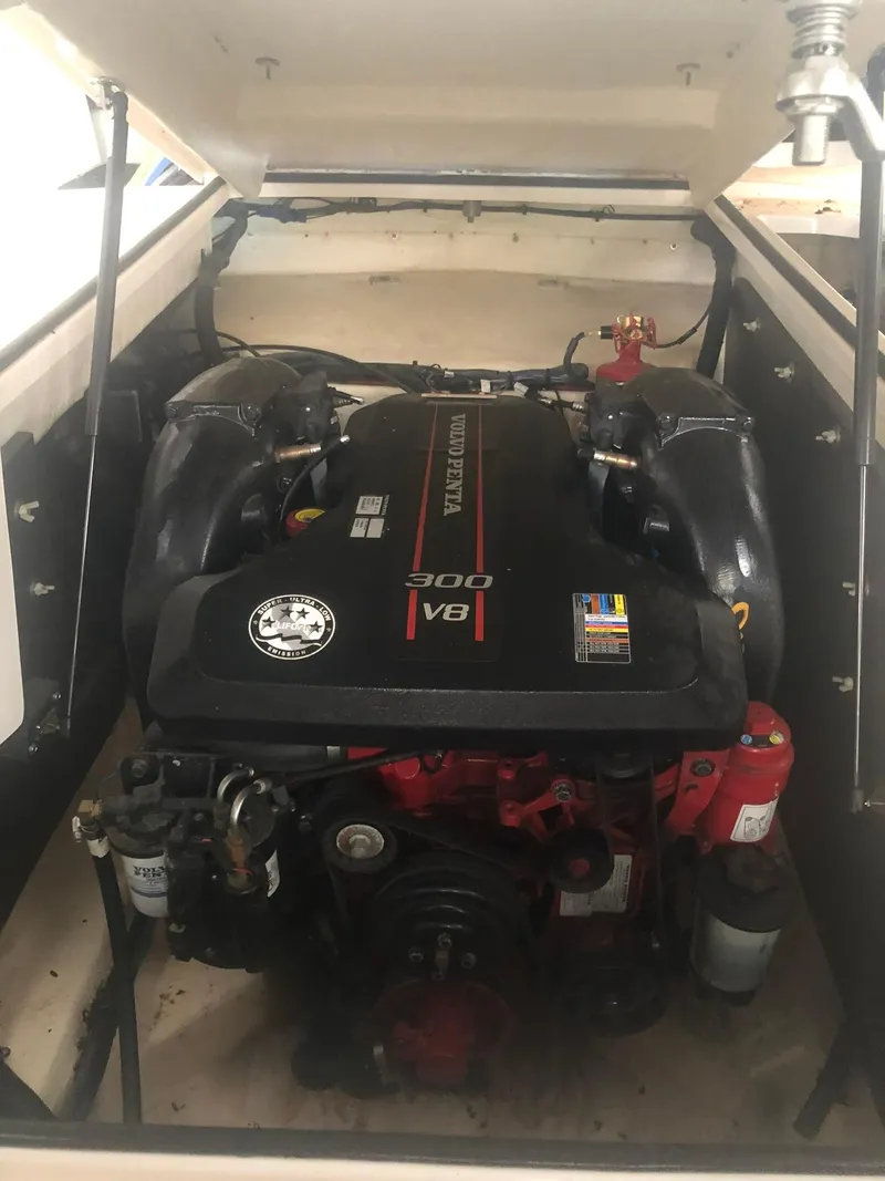 Slide: The Image of 2013 Regal 27 FasDeck RX boat engine compartment with Volvo Penta V8 300 engine. - 19