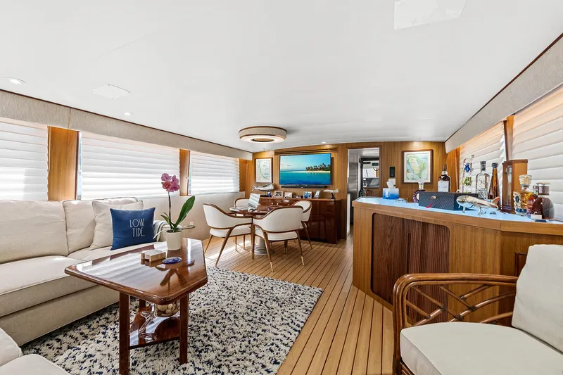 Slide: The Image of Luxurious interior of 1989 Hatteras 70 Motor Yacht with modern furnishings. - 3