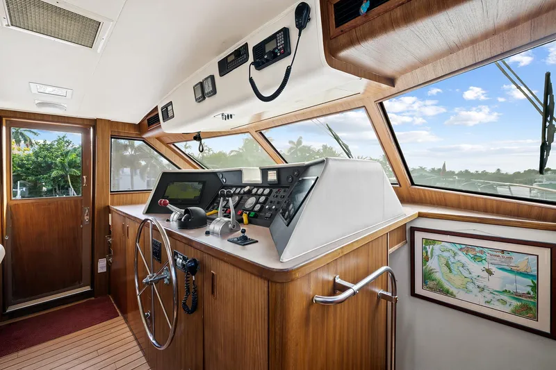 Slide: The Image of Interior helm of 1989 Hatteras 70 Motor Yacht with navigation equipment and panoramic windows. - 41