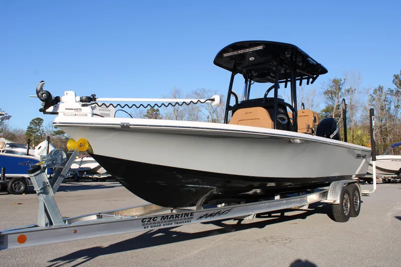 Slide: The Image of 2025 Sea Pro 250 Bay boat on trailer, featuring sleek design and modern equipment. - 1