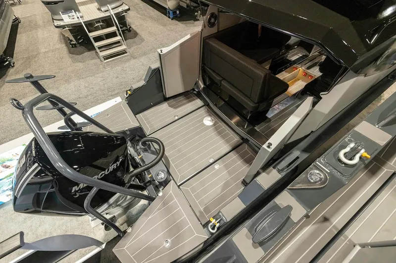 Slide: The Image of 2024 G-Force G-Force 8 boat interior with Mercury engine and seating area. - 10