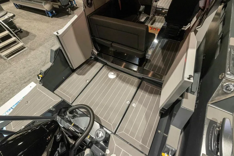 Slide: The Image of 2024 G-Force 8 boat interior with open storage compartments and seating. - 11