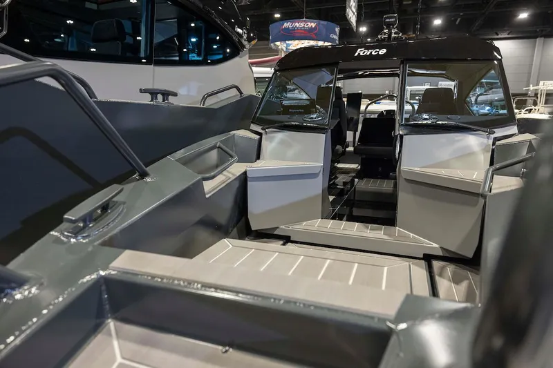 Slide: The Image of 2024 G-Force 8 boat interior at a boat show. - 13