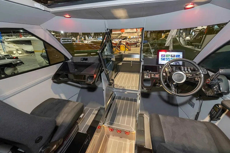 Slide: The Image of Interior of 2024 G-Force 8 boat with modern cockpit and navigation controls. - 19