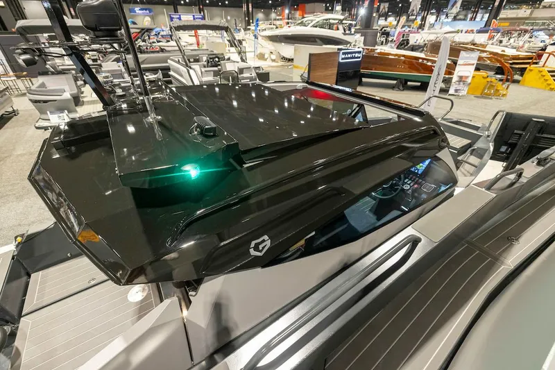 Slide: The Image of 2024 G-Force 8 luxury boat on display at a boat show. - 24