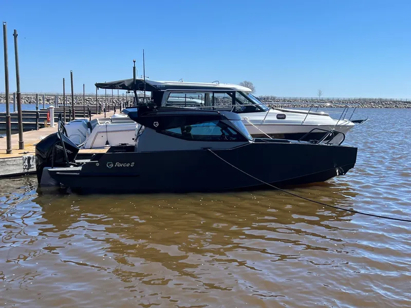 Slide: The Image of 2024 G-Force 8 boat docked on a sunny day. - 27