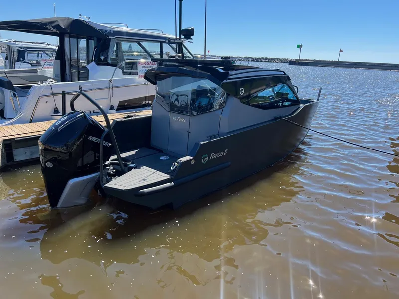 Slide: The Image of 2024 G-Force G-Force 8 boat docked at marina on sunny day. - 34