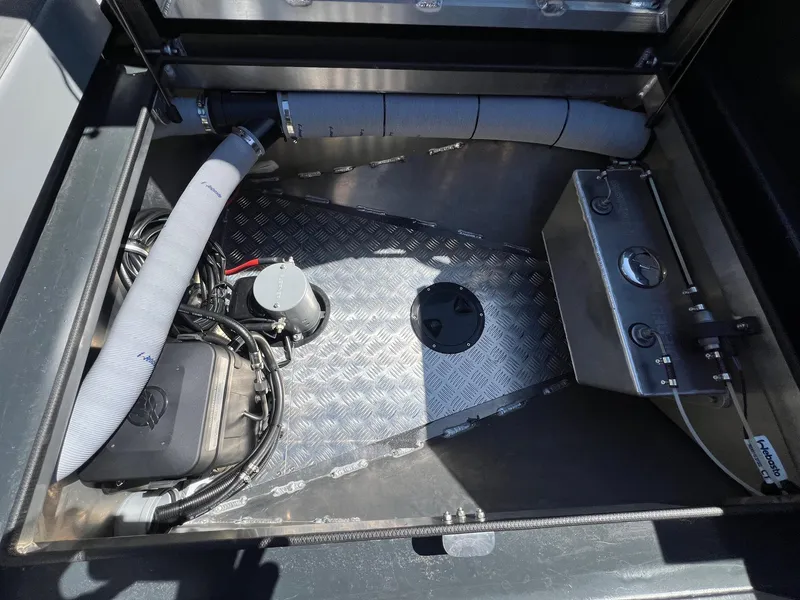 Slide: The Image of G-Force 8 2024 model engine compartment with wiring and control panel. - 37