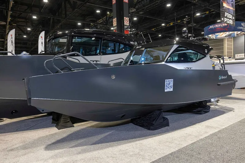 Slide: The Image of 2024 G-Force 8 boat displayed at an indoor boat show. - 4